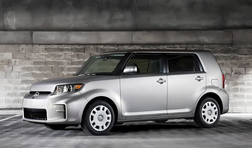 A silver Scion xB vehicle that is no longer in production.