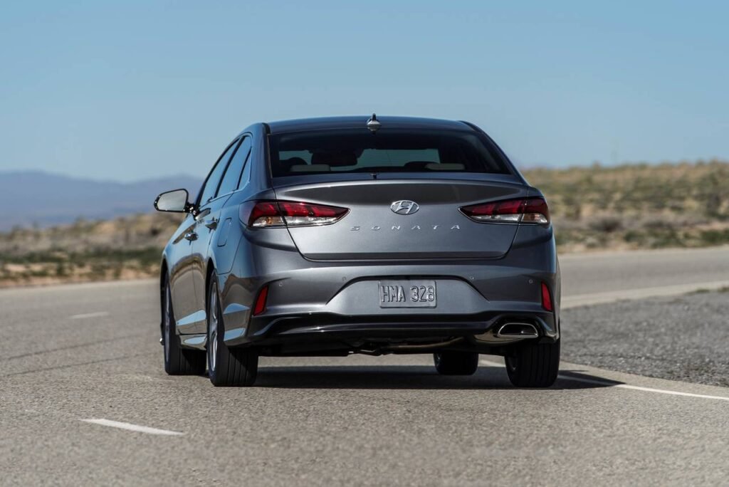 A 2019 Hyundai Sonata cruising on an open highway, epitomizing reliable performance and aerodynamic design.