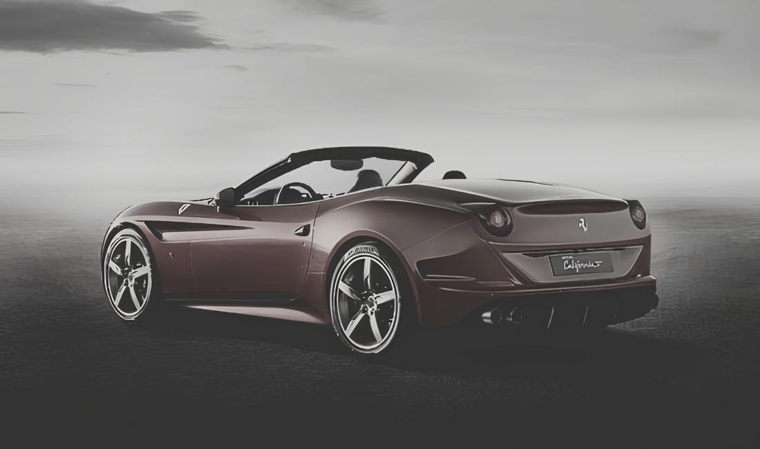 A sleek Ferrari California parked under a cloudy sky.