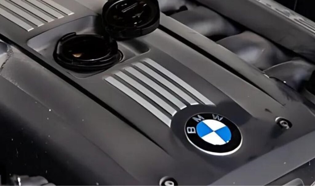 Close-up of a BMW engine bay during maintenance.